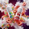 MAMASAN 媽媽桑煙油 - 40mg 彩虹糖山楂冰丁鹽 MAMASAN 媽媽桑 30ml 尼古丁鹽煙油主圖。畫面展示帶有女性頭像標誌的瓶身,環繞飛濺的繽紛彩虹糖果 (Skittles)、新鮮山楂果實、冰塊、薄荷葉與綿密的白色煙霧視覺。強調 2026 年進口煙油界黑馬的創新酸甜口感,搭配 40mg 高解癮丁鹽與丁鹽技術,帶來細膩絲滑且極具層次感的味蕾狂歡,專為小煙設備優化。